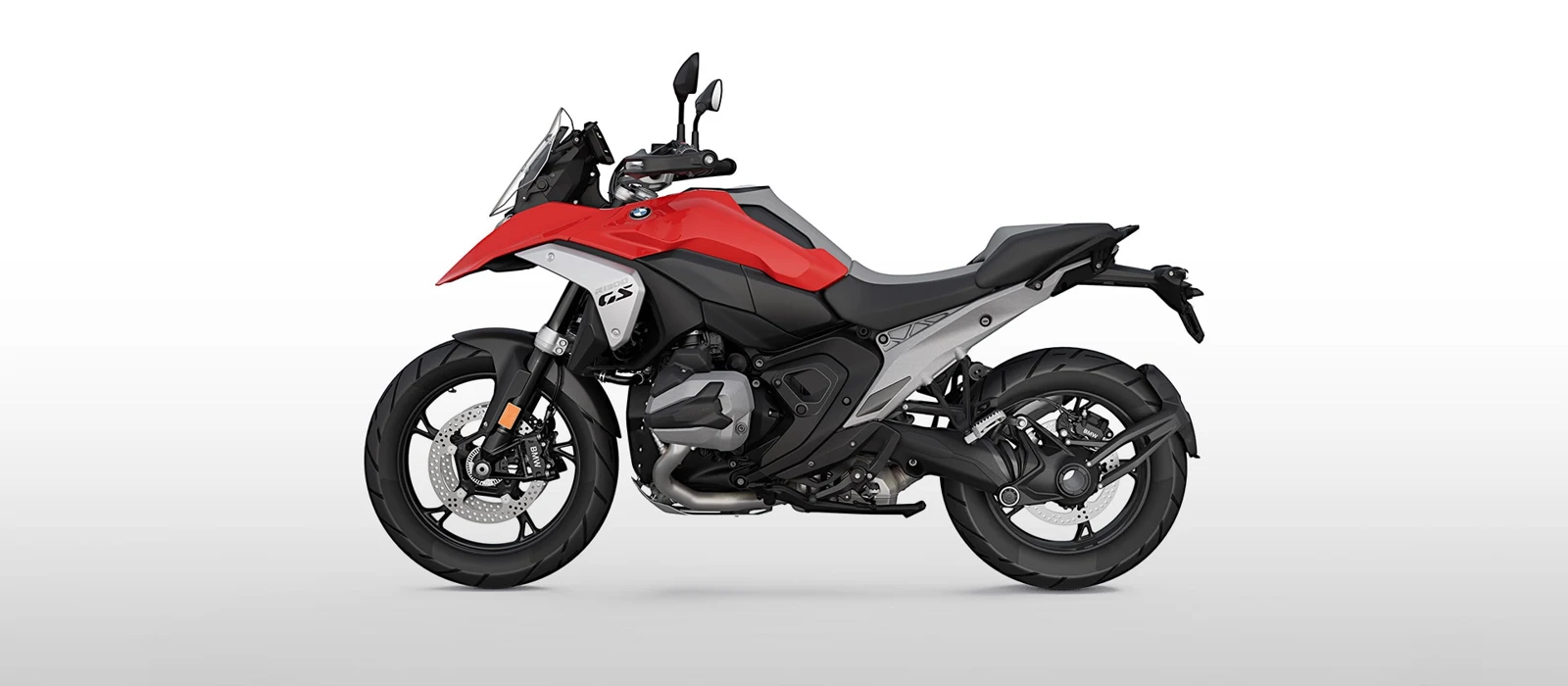 BMW R 1300 GS en imagen oficial de catálogo. Ilustra la columna sobre acabados y equipamiento; el color y las opciones de la imagen pueden añadir coste al precio base.